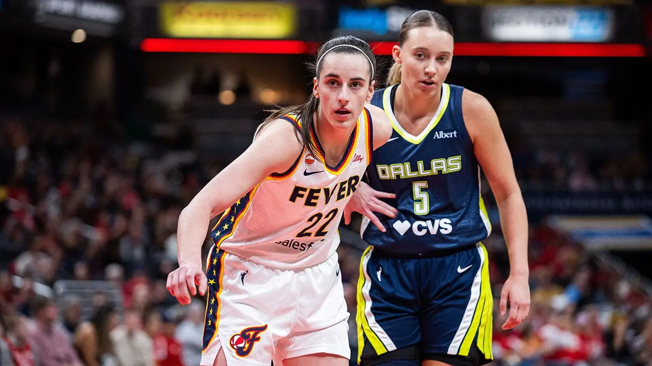 Bueckers Foul Sparks On-Court Exchange with Clark