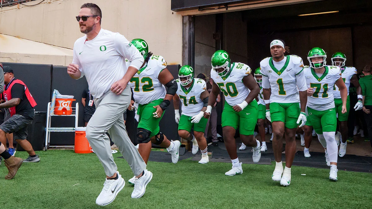 Dan Lanning Defends Dante Moore After Post-Game Absence