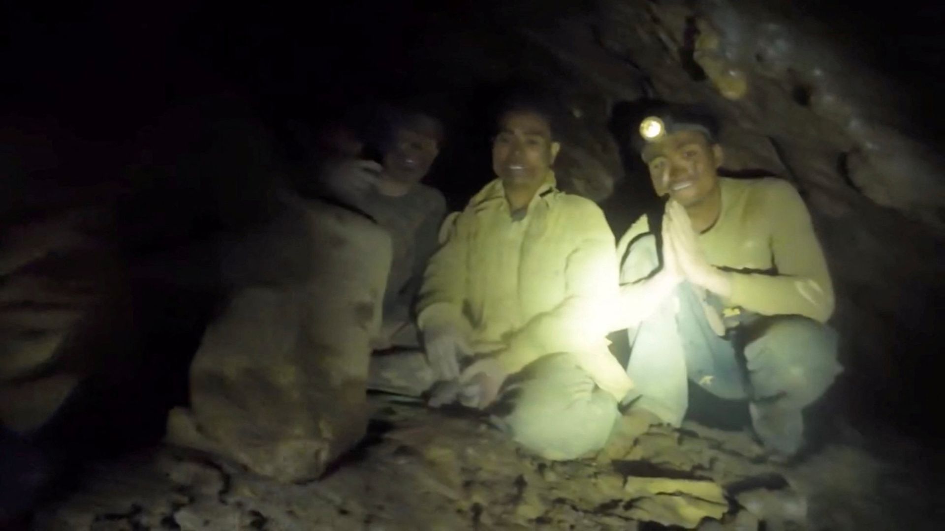Five people found alive in flooded Laos cave, two remain missing