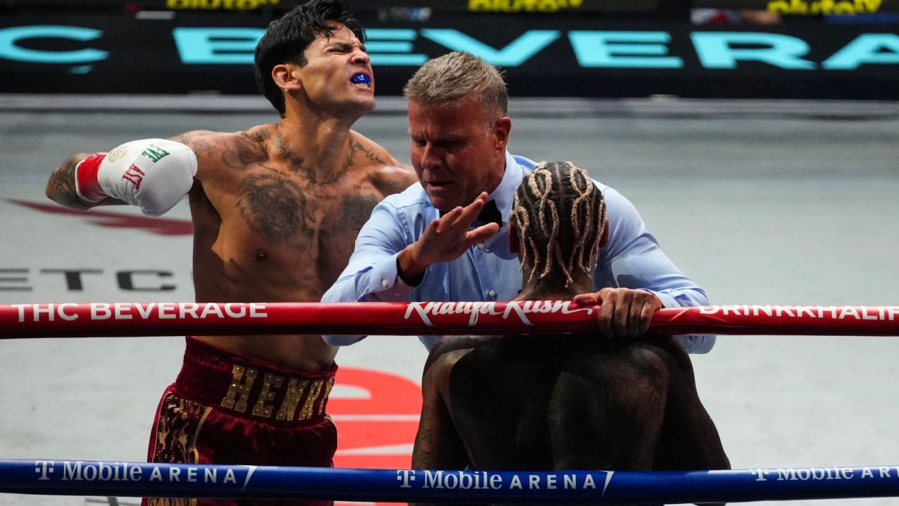 Garcia TKO's Benn, Retains WBC Title