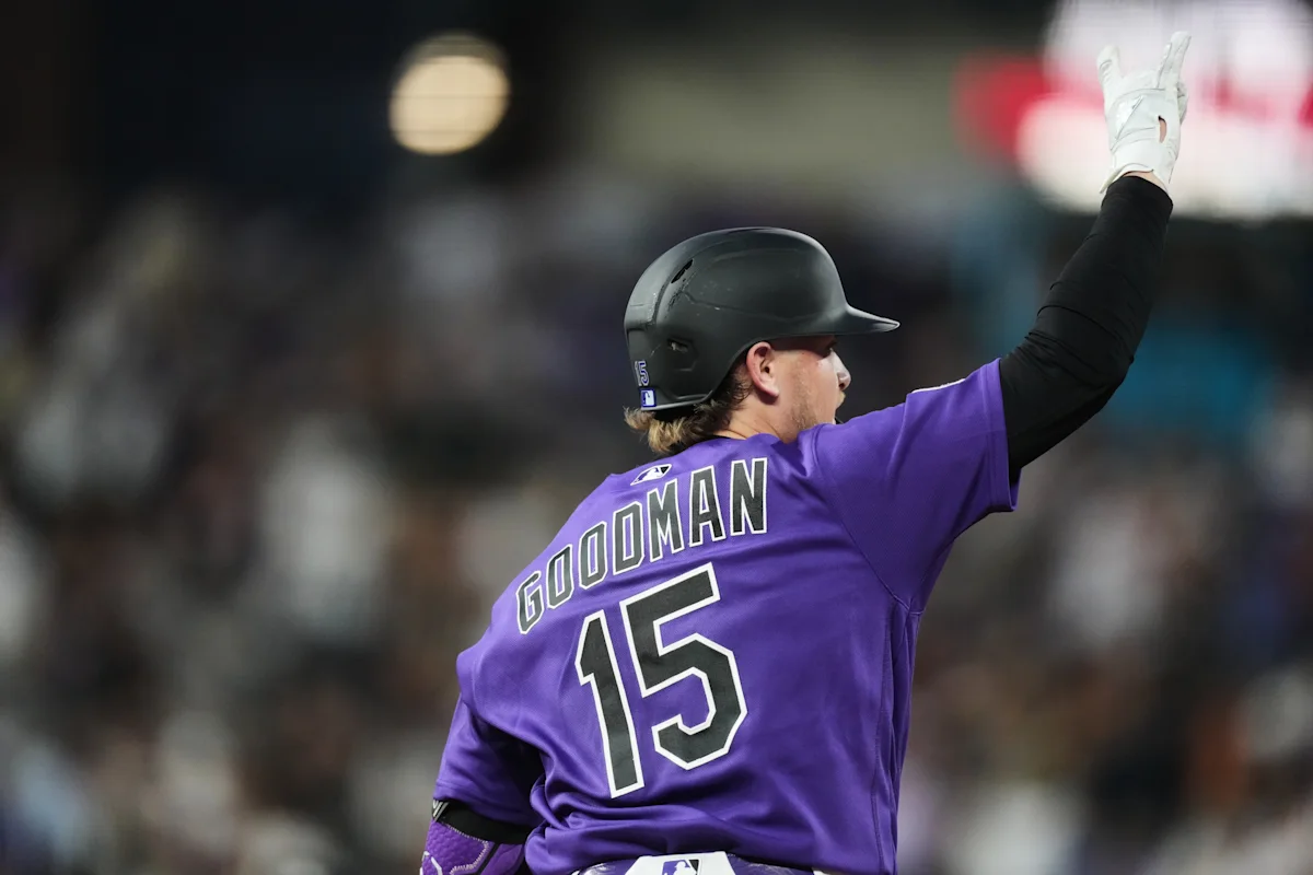 Goodman's Two Home Runs Lead Rockies Past Royals